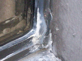Aluminum Corrosion: Crevice corrosion on an anodized aluminum window frame