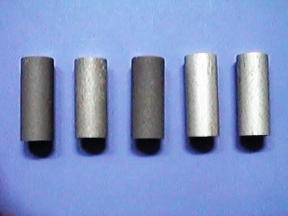 Five different alloys with hard coat anodizing. Because of the different alloys the appearance ranges from silvery to dark grey.